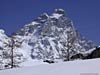 Cervinia - a cable car sails in front of the Matterhorn
