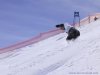 A snowboarder hits the bumps